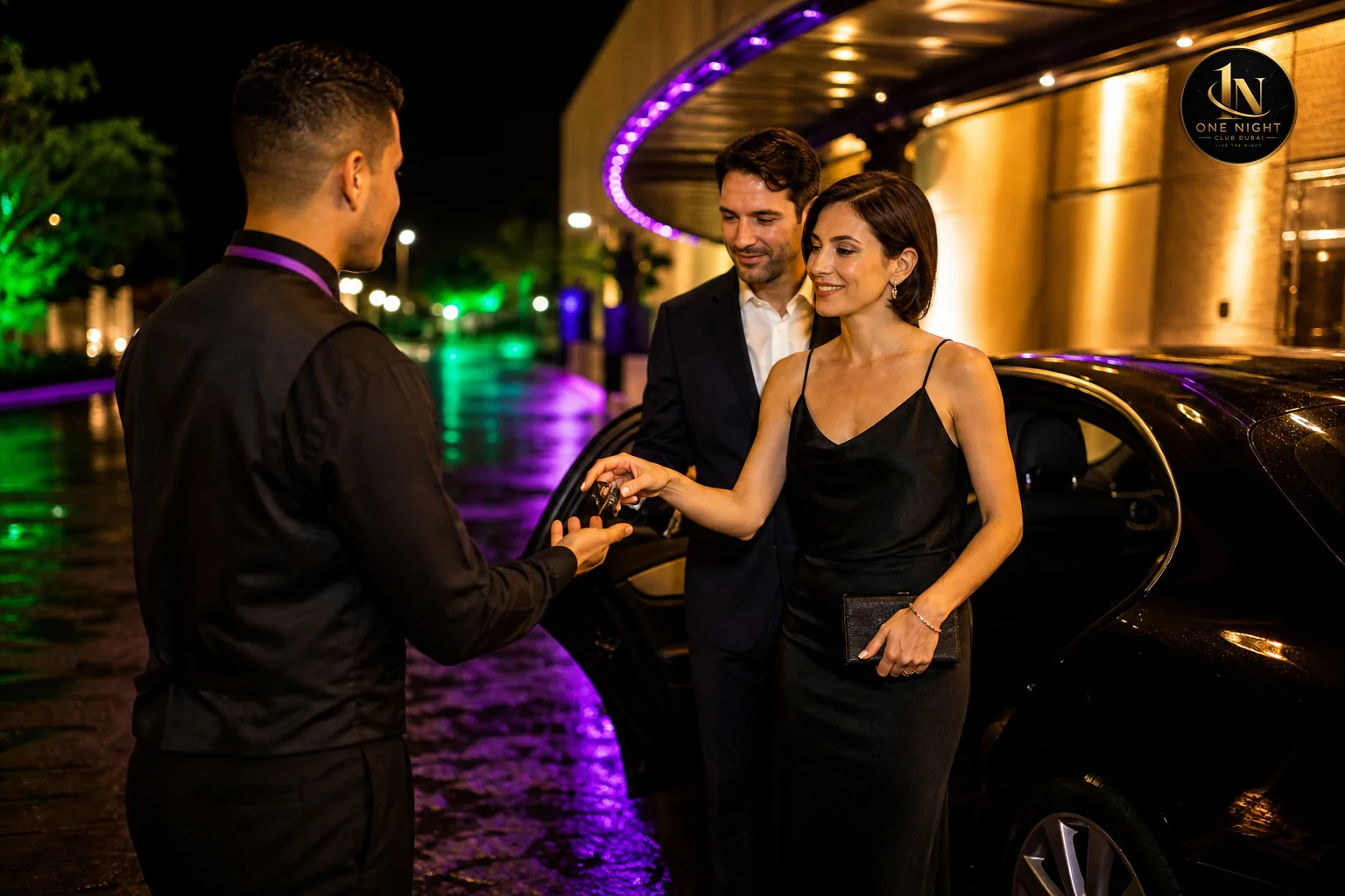 Valet attendant in uniform greeting guests and taking car keys outside an upscale nightclub entrance. Photorealistic close-up nighttime photo of a professional valet attendant in a black uniform with a purple lanyard accepting car keys from