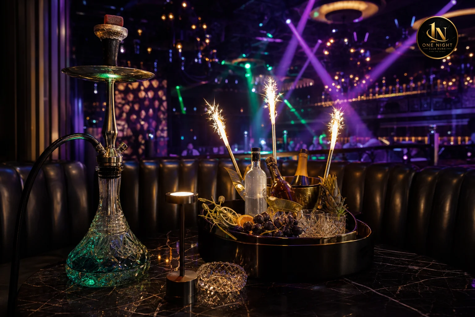 VIP table set up with shisha and bottle service in a Dubai nightclub. Photorealistic close-up of a VIP nightclub table setup in Dubai with an elegant shisha pipe, premium bottle service tray with sparkler candles, black marble table surface