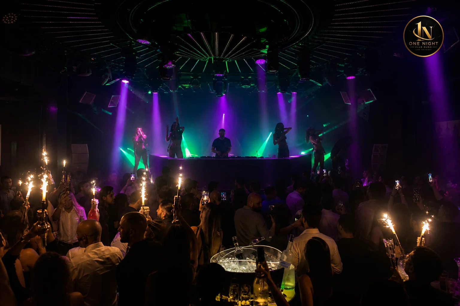 DJ booth and live entertainment stage inside a Dubai nightclub with Arabic and international music vibe. Photorealistic interior photograph of a luxury Dubai nightclub stage at night, DJ booth glowing with purple and emerald green stage
